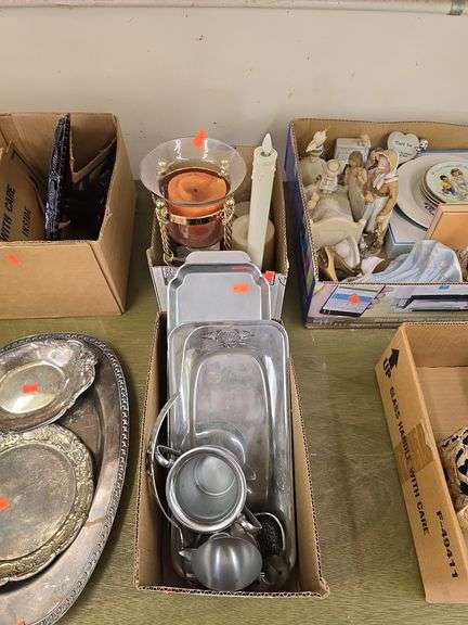 2 boxes of dinnerware and candles image