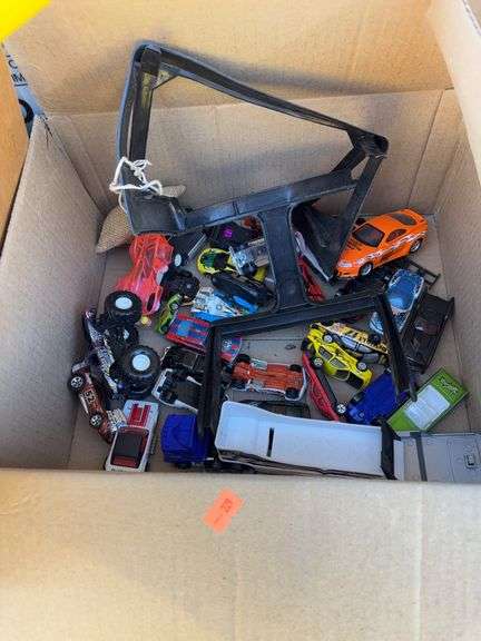 3 boxes of toys. image