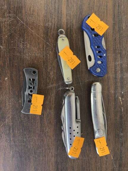 Assortment of pocket knives image