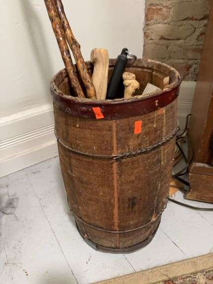 Small barrel with miscellaneous stick/walking sticks image