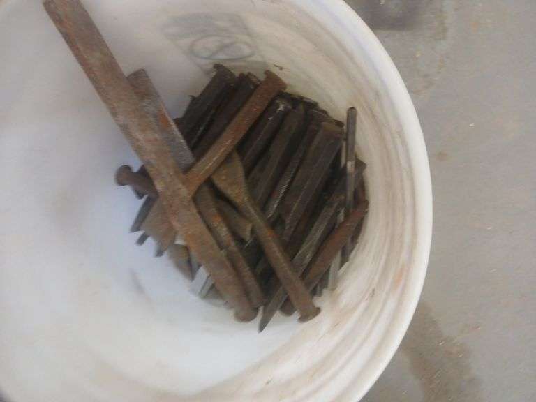 Bucket of metal chisel image