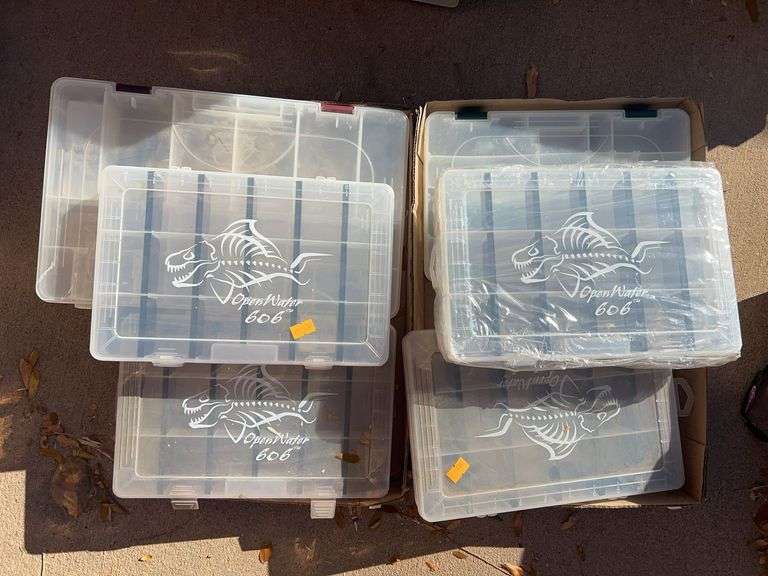 Assortment of plastic tackle boxes image