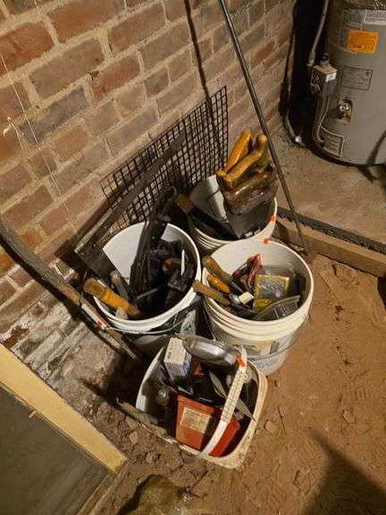 4 buckets of tools. image