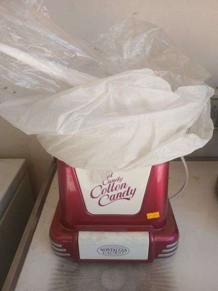 Hand candy cotton candy. Nostalgia electronics image