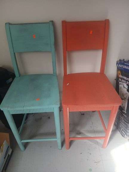 Two wooden chairs. image