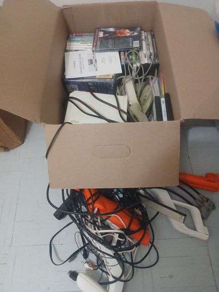 Wii console with 5 games 2 guns and 2 controllers. DVD player with movies. image
