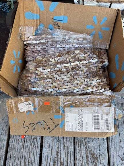 Box full of tiles and miscellaneous image