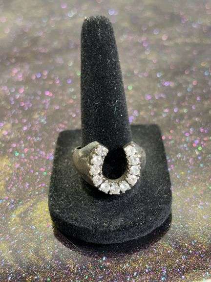 Sllver horse shoe ring with rhinestones marked .925 image