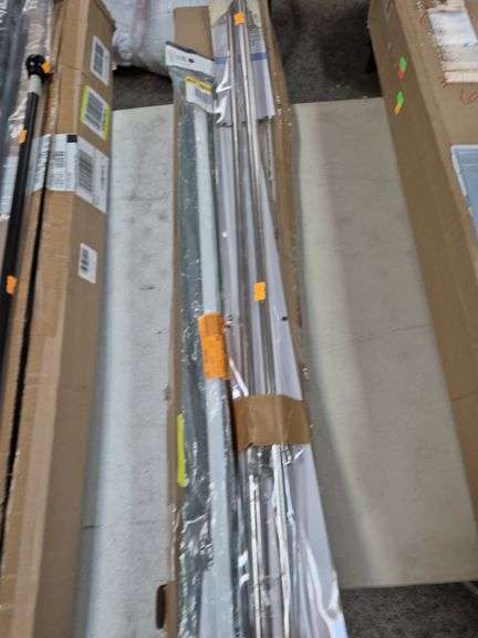 2 curtain rods and 2 shower curtain rods image