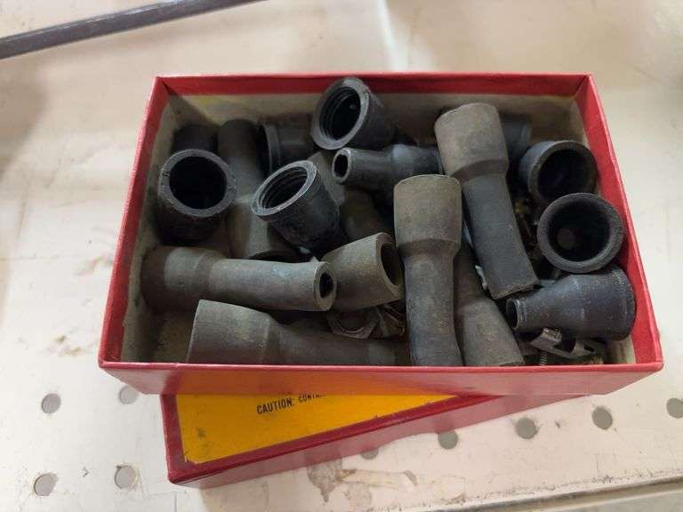 Small box of rubber boots and Cummins brand electrical test lead kit image