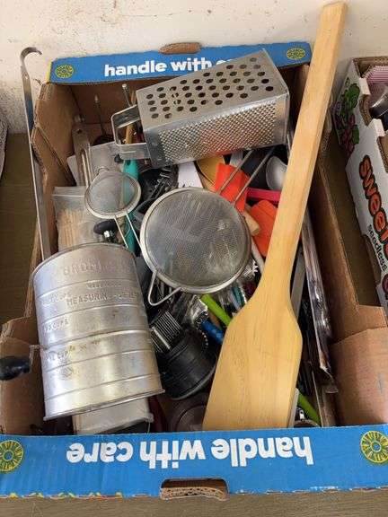 Box of miscellaneous kitchen utensils image
