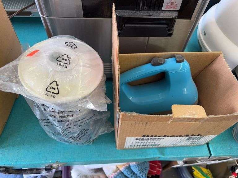 Hand mixer and food saver jar image