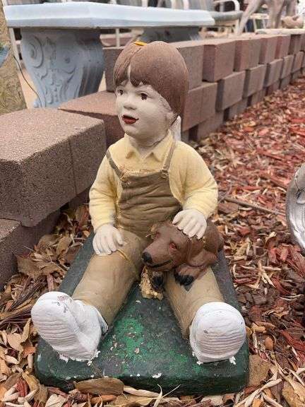 Boy with dog stone yard decoration image