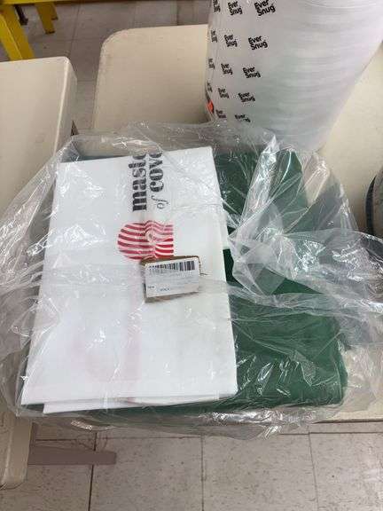 Green velvet couch, cover, and a ever snug pillow image