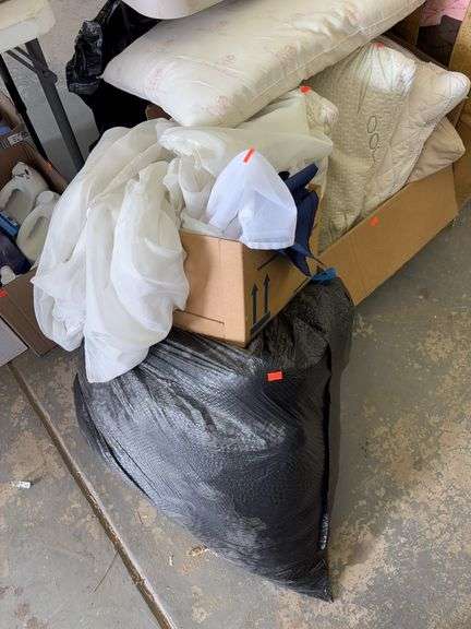 Box and bag of pillows and miscellaneous fabrics image