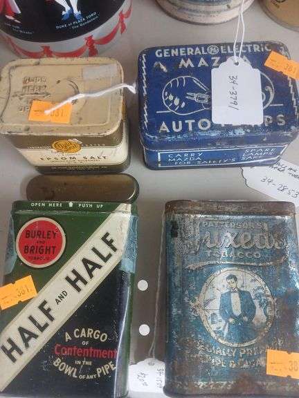 4 vintage tin cans image