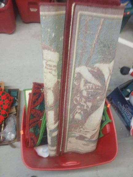 Bin of holiday rugs image