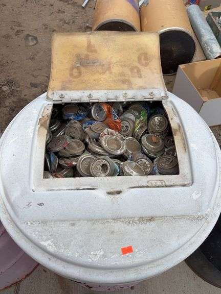 Barrel with lid filled with aluminum cans image