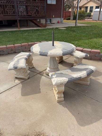 Cement table and chairs image