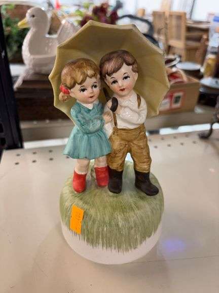 Porcelain music box figurine image