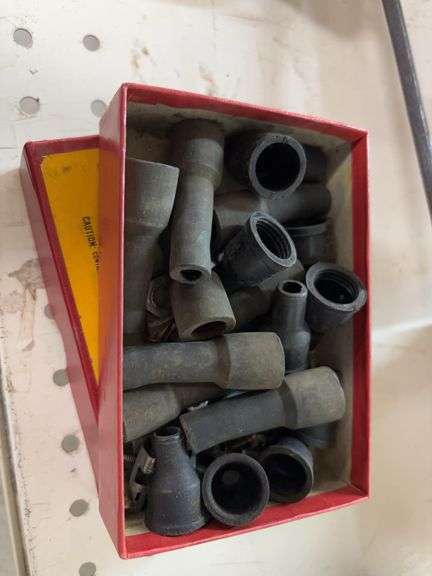 Small box of rubber boots and Cummins brand electrical test lead kit image