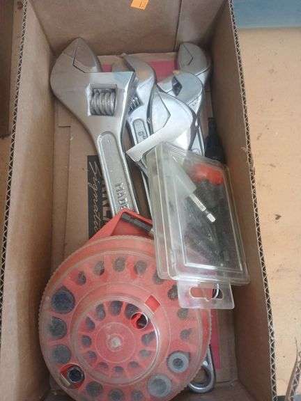 Box of adjustable wrenches image