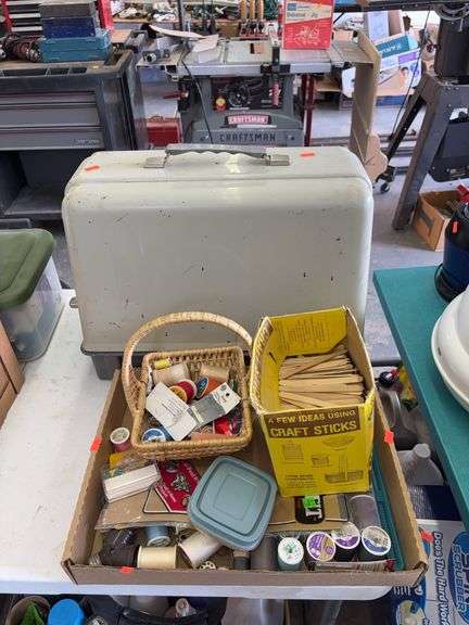 Sears Kenmore sewing machine with pedal and a box of craft supplies image