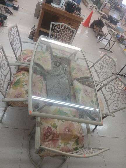 Patio table with 6 chairs image