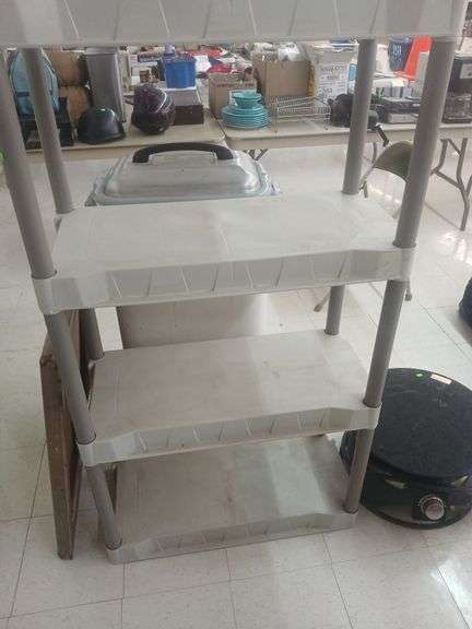 White plastic storage stand image