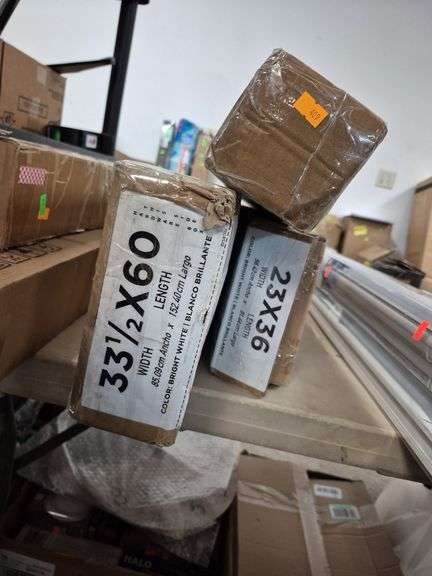 3 boxes of blinds image