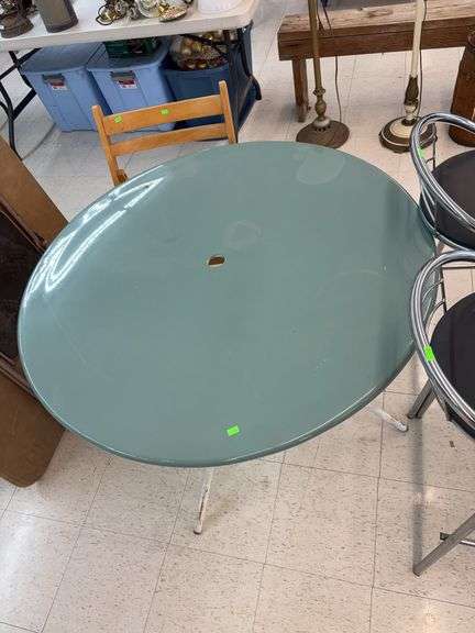 Blue metal patio table image