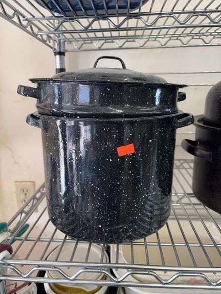 Black speckled enamelware stock pot image