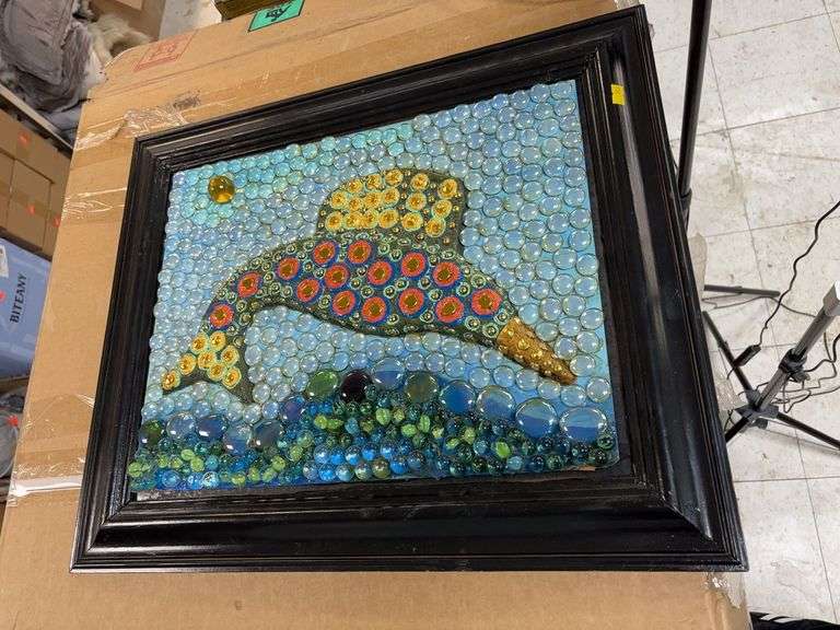 Dolphin picture made out of various glass pieces image