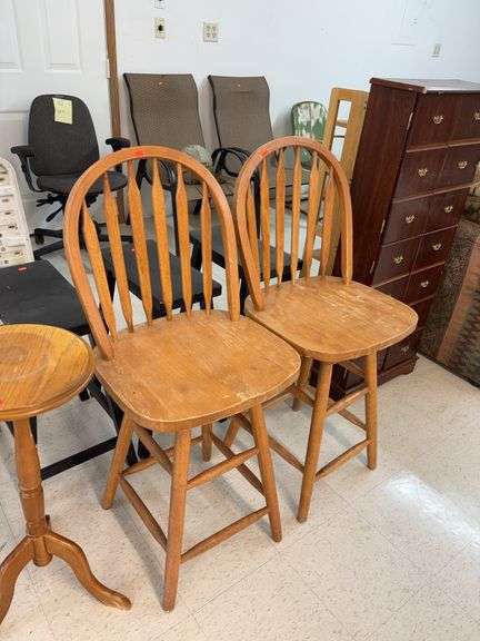 2 wooden bar stools image