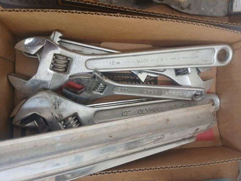 Box of adjustable wrenches image