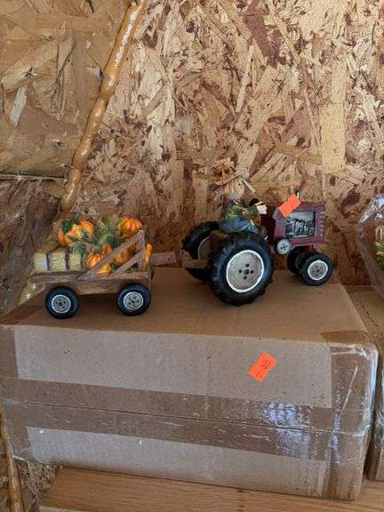 Scarecrow on tractor  Halloween decoration image