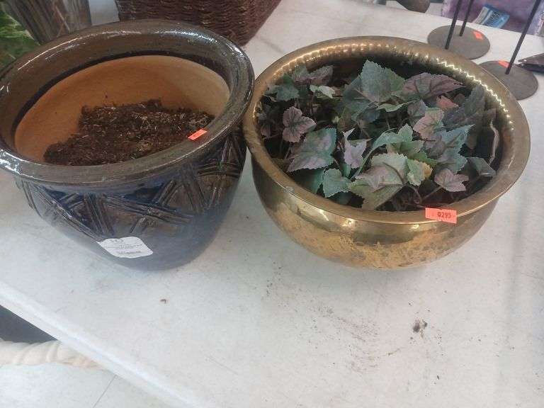 Glass/metal flower pots. image