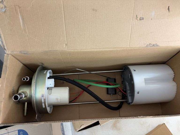 Electric fuel pump for Dodge Magnum and fuel pump assembly for a Chevy and GMC Sierra and Silverado image