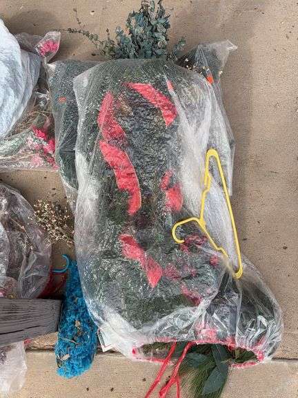 2 bags of wreaths and garland ￼ image
