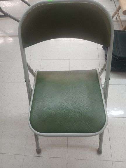 Metal folding chair green. image