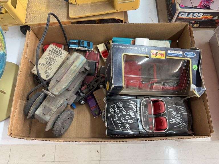 Box of miscellaneous model cars image