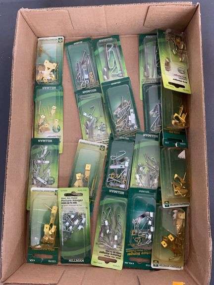 Box of assorted picture hangers image
