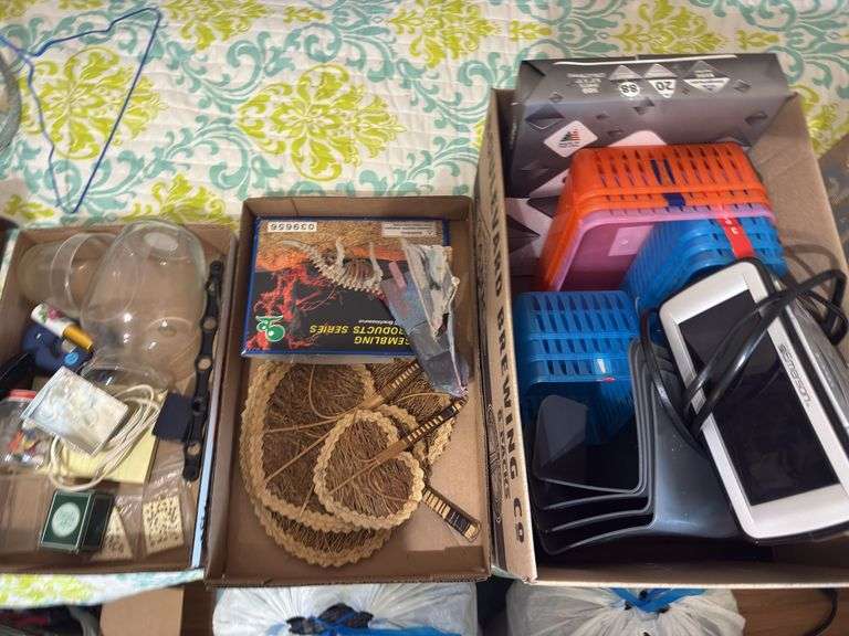 3 boxes of office supplies, knickknacks. image