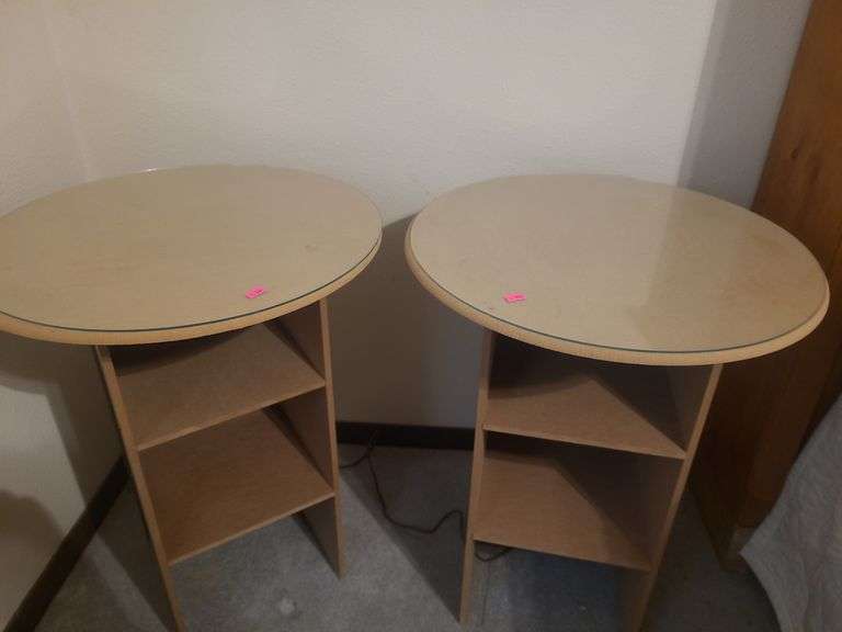 2 round pressed wood tables with glass tops image