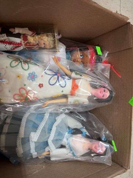 Box of dolls image