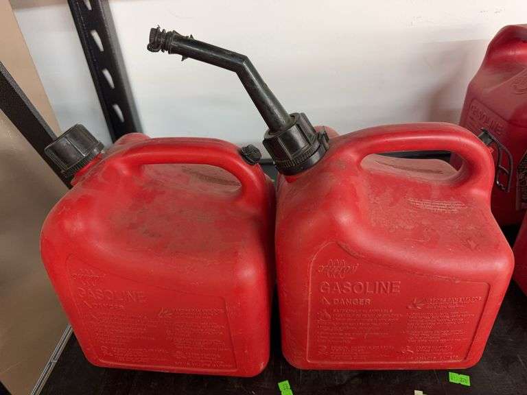 2- 2 gallon gas cans (one is missing spout) image