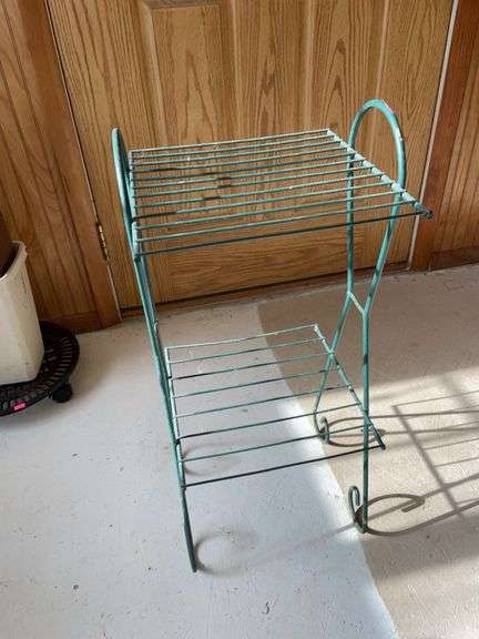 Green metal plant stand image