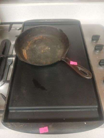 Cast iron pan and sheet pan. image