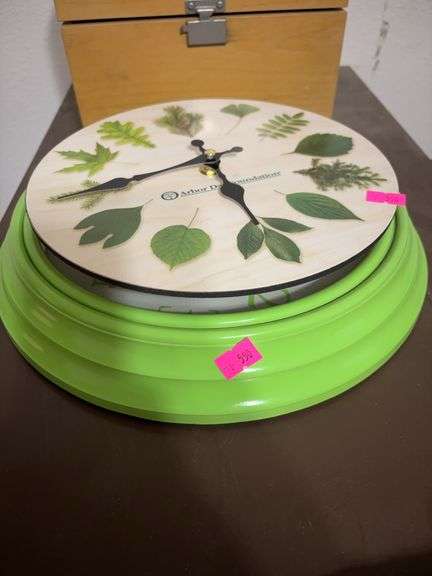2 wall clocks and a box of garden seeds image