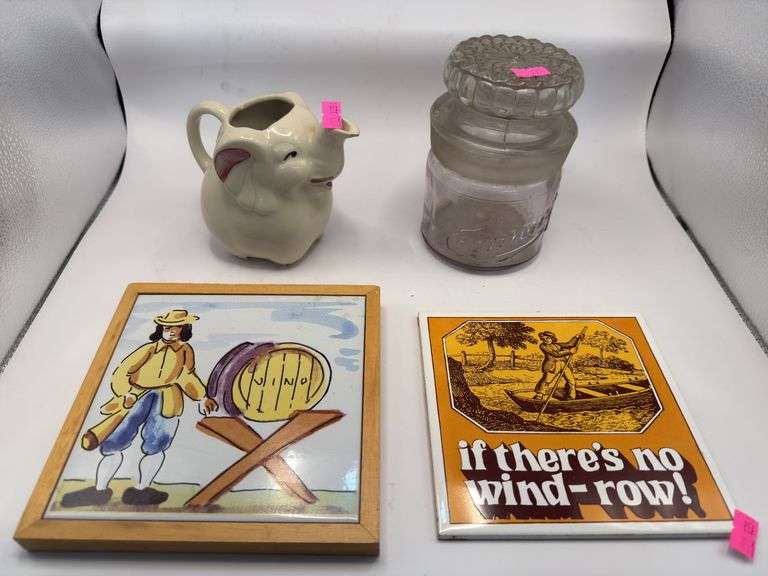 Porcelain tiles, glass container, elephant creamer pot image